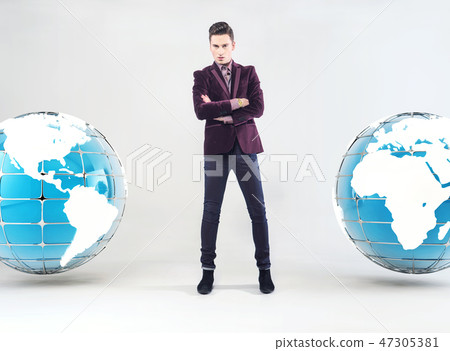 Young businessman and Earth globe 47305381