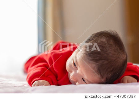 A prone baby 47307387