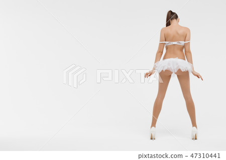 Beautiful sporty woman body. Sexy female slim tanned girl 47310441