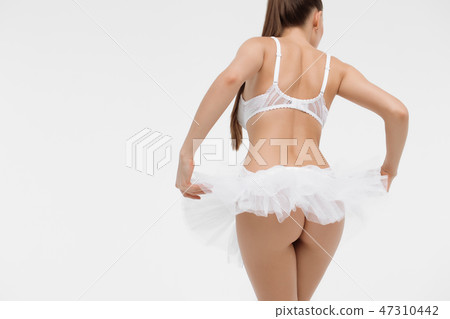 Beautiful sporty woman body. Sexy female slim tanned girl Beautiful sporty woman body. Sexy female slim tanned girl 47310442