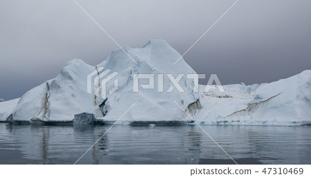 Global Warming and Climate Change - Icebergs from melting glacier on Greenland 47310469