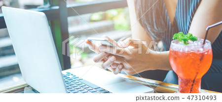 Business woman hand using a cell phone 47310493