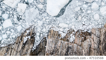 Climate Change and Global Warming - Icebergs drone aerial image top view 47310588