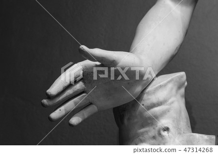 stone statue detail of human hand 47314268