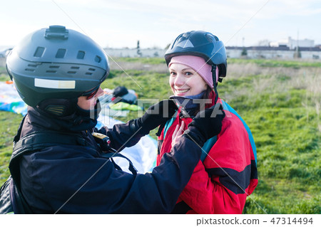 Preparation of tandem paraglider for the first flight Preparation of tandem paraglider for the first flight 47314494