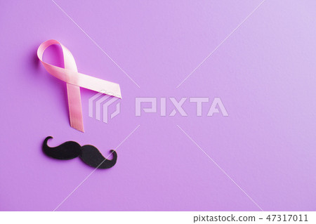 Pink breast cancer ribbon and mustache.  47317011