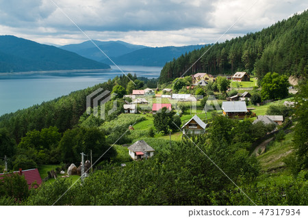 Cloudy landscape view from Lake Bicaz in Romania Cloudy landscape view from Lake Bicaz in Romania 47317934