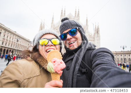 Travel in winter and Italy concept - Happy young couple take selfie photo with ice-cream in front of Travel in winter and Italy concept - Happy young couple take selfie photo with ice-cream in front of 47318453