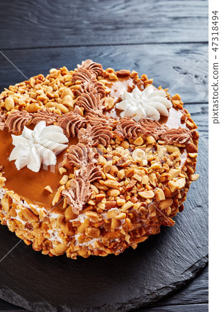 tasty peanut cake ton a black plate tasty peanut cake ton a black plate 47318494