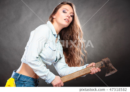 Sexy strong woman feminist with axe working. 47318582
