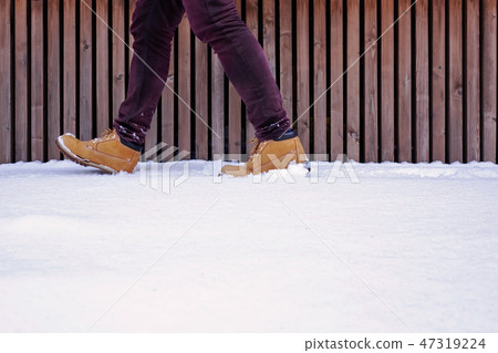 View of shoes or boots footprint in fresh snow. View of shoes or boots footprint in fresh snow. 47319224