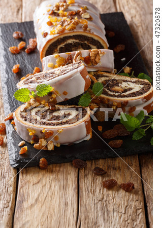 Traditional Polish poppy roll with raisins, walnut Traditional Polish poppy roll with raisins, walnut 47320878