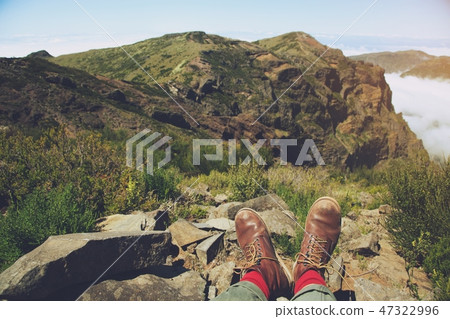 Traveler resting man hipster hiking boots 47322996