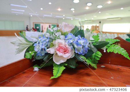 Prepare a beautiful flower put in vase. Prepare a beautiful flower put in vase. 47323406