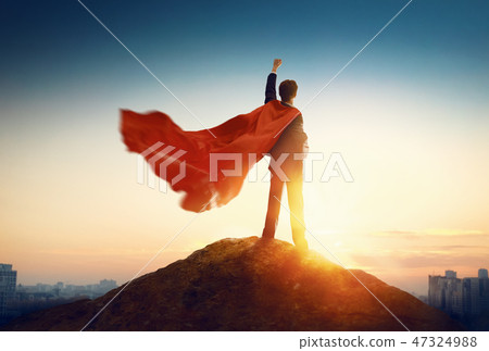 superhero businessman looking at city 47324988