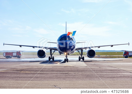 Wet airplane after water salute procedure Wet airplane after water salute procedure 47325686