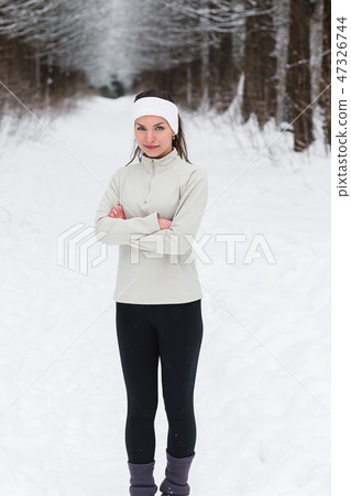 Sport woman running in winter. Sport woman running in winter. 47326744