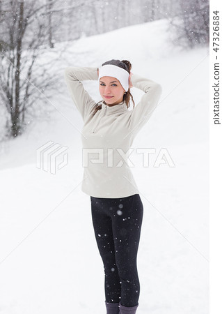 Sport woman running in winter. Sport woman running in winter. 47326884