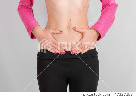 pregnant women hand heart belly woman health concept menstruation cycle pregnant women hand heart belly woman health concept menstruation cycle 47327198