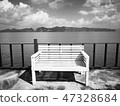 The white wooden bench. 47328684