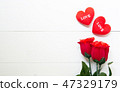 Present gift with red rose flower and heart shape 47329179