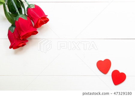Present gift with red rose flower and heart shape Present gift with red rose flower and heart shape 47329180