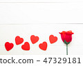 Present gift with red rose flower and heart shape 47329181