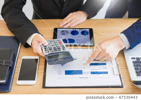 Team work business working discussing a new financial plan with Team work business working discussing a new financial plan with 47330443