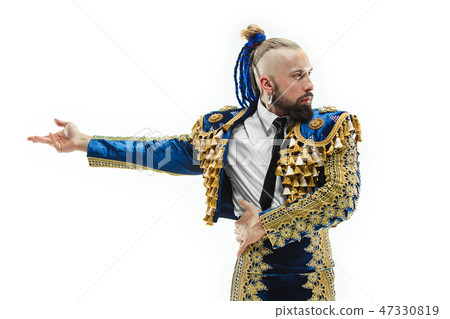 Torero in blue and gold suit or typical spanish bullfighter isolated over white Torero in blue and gold suit or typical spanish bullfighter isolated over white 47330819