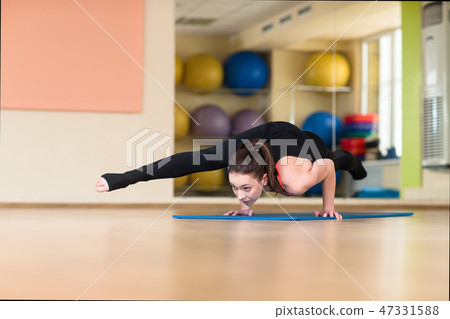 woman yoga in Bakasana Crane Pose, Crow Pose 47331588