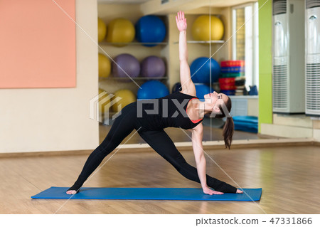 Yoga Parivrtta Trikonasana, Revolved Triangle Pose Yoga Parivrtta Trikonasana, Revolved Triangle Pose 47331866