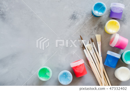 Set of clean paint brushes and multicolor paints. Set of clean paint brushes and multicolor paints. 47332402