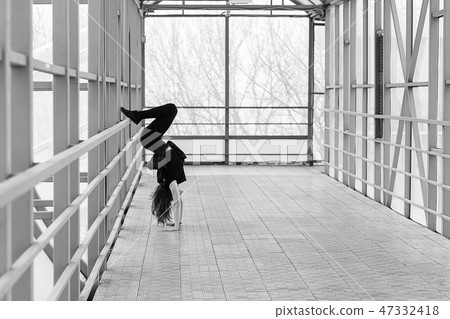 sports woman doing stretching outdoors sports woman doing stretching outdoors 47332418