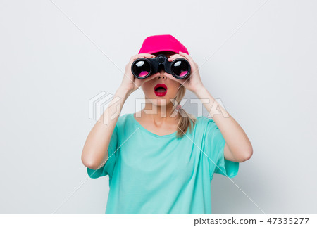 girl looking for something with binocular girl looking for something with binocular 47335277