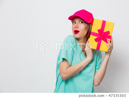 young girl with holiday present box young girl with holiday present box 47335303