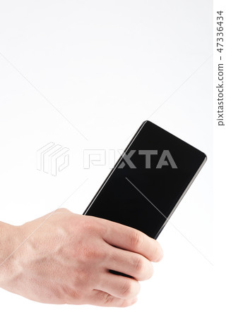 Close-up of back modern smartphone in hand Close-up of back modern smartphone in hand 47336434