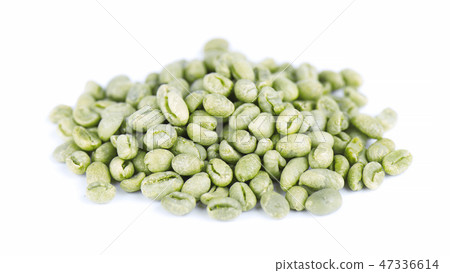 Green coffee beans, isolated on white background. Medium green peaberry coffee beans. 47336614