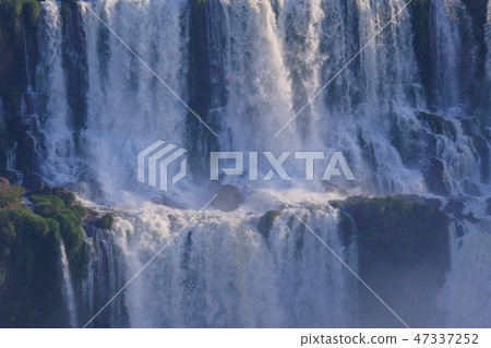Close view of Iguazu Falls, Cataratas Foz Do Iguacu, waterfalls of the Iguazu River, Brazil Close view of Iguazu Falls, Cataratas Foz Do Iguacu, waterfalls of the Iguazu River, Brazil 47337252
