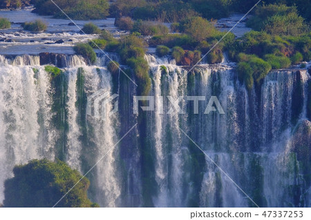 Close view of Iguazu Falls, Cataratas Foz Do Iguacu, waterfalls of the Iguazu River, Brazil Close view of Iguazu Falls, Cataratas Foz Do Iguacu, waterfalls of the Iguazu River, Brazil 47337253