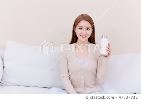 Beautiful young woman's daily life concept photo 101 47337738