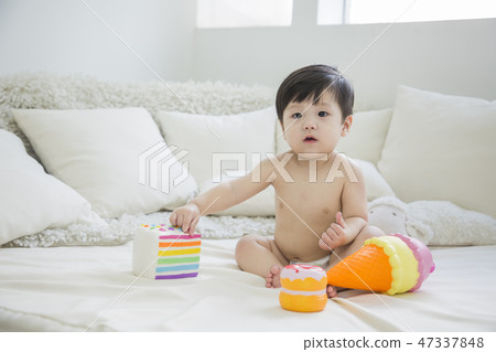 Little two cute babies photo. Baby wearing diaper in white bedroom. 272 47337848