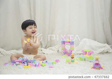 Little two cute babies photo. Baby wearing diaper in white bedroom. 240 Little two cute babies photo. Baby wearing diaper in white bedroom. 240 47337882