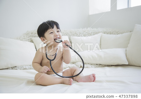 Little two cute babies photo. Baby wearing diaper in white bedroom. 232 47337898
