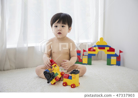 Little two cute babies photo. Baby wearing diaper in white bedroom. 200 Little two cute babies photo. Baby wearing diaper in white bedroom. 200 47337903