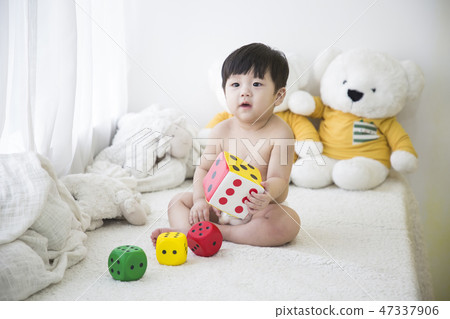 Little two cute babies photo. Baby wearing diaper in white bedroom. 269 Little two cute babies photo. Baby wearing diaper in white bedroom. 269 47337906