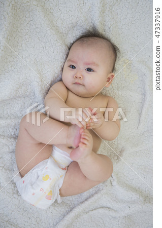 Little two cute babies photo. Baby wearing diaper in white bedroom. 178 Little two cute babies photo. Baby wearing diaper in white bedroom. 178 47337916