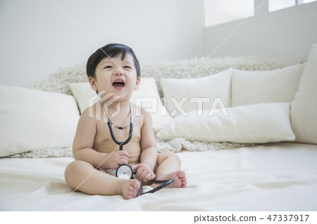 Little two cute babies photo. Baby wearing diaper in white bedroom. 246 Little two cute babies photo. Baby wearing diaper in white bedroom. 246 47337917