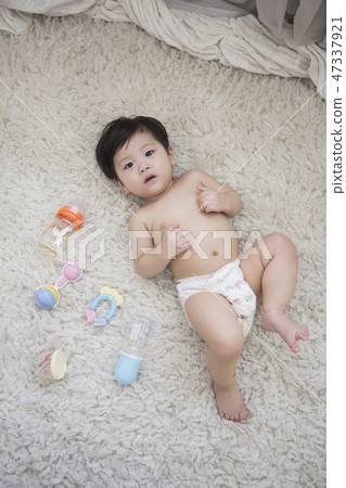 Little two cute babies photo. Baby wearing diaper in white bedroom. 250 47337921