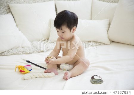 Little two cute babies photo. Baby wearing diaper in white bedroom. 196 47337924