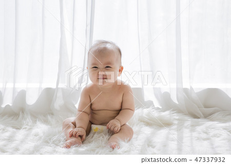 Little two cute babies photo. Baby wearing diaper in white bedroom. 147 Little two cute babies photo. Baby wearing diaper in white bedroom. 147 47337932